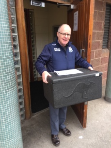 Donagh O'Brien Picking up Meals On Wheels delivery.
